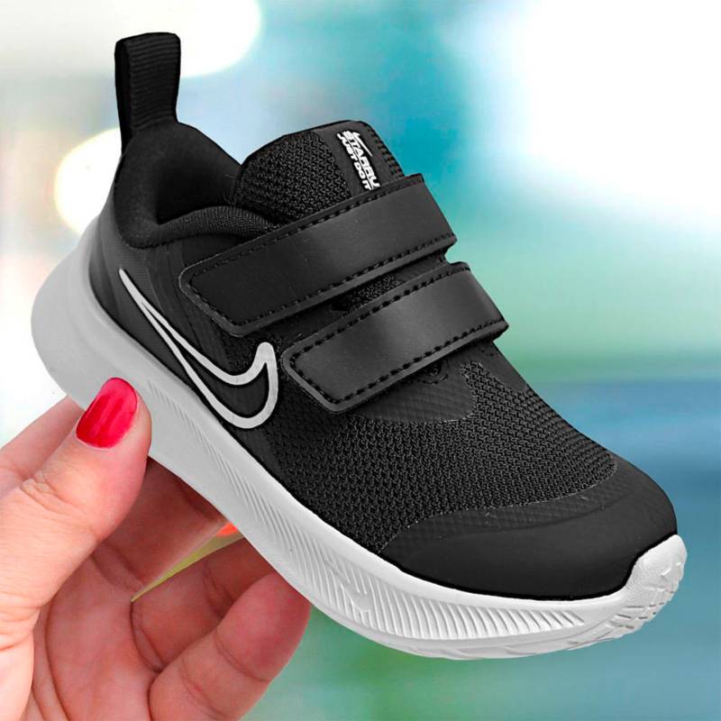 Zapatillas negras para niños/as. Nike ES
