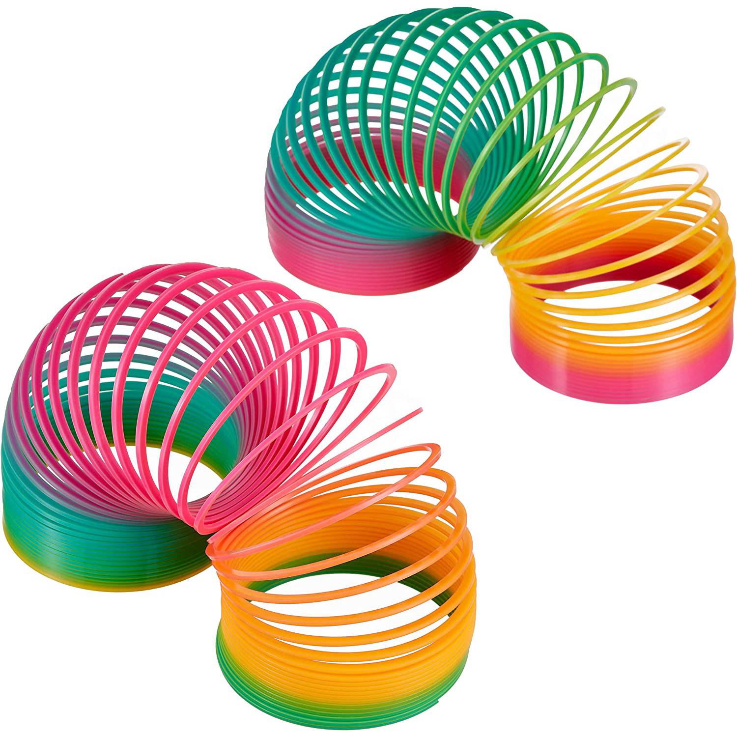 Muelle de juguete arcoíris y producto de plástico en estudio aislado contra  una maqueta de fondo azul juguetes flexibles espirales de colores y  artículos infantiles estirados para jugar y divertirse