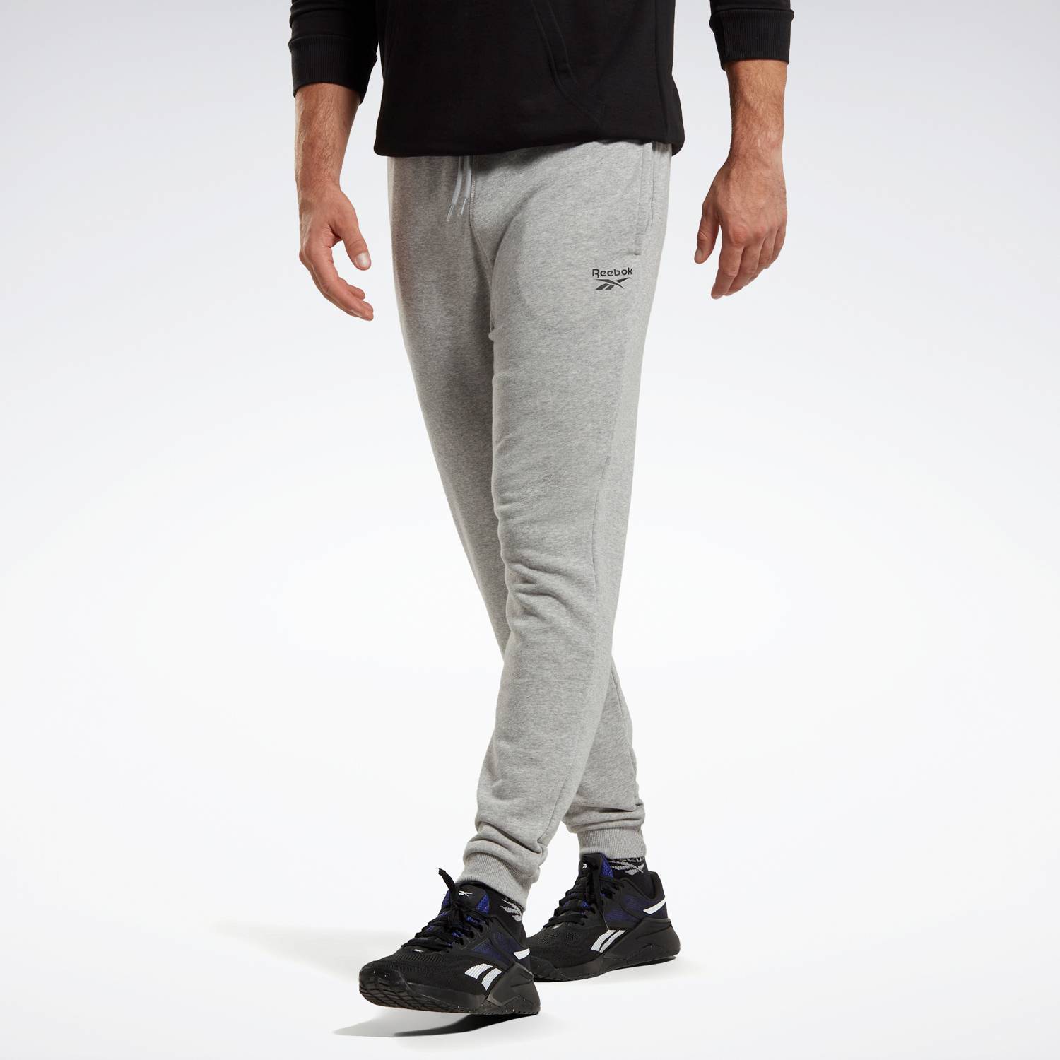 Reebok pantalones hombre new arrivals